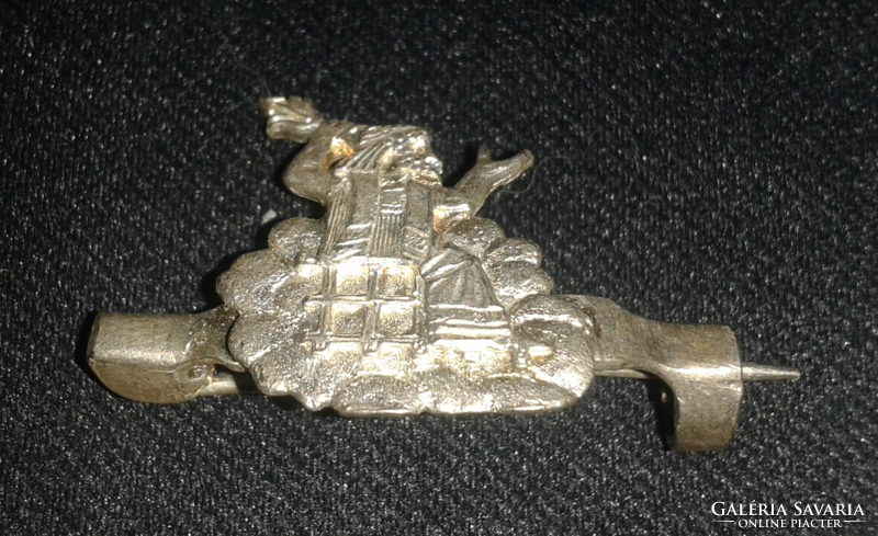 Old silver or silver-plated figure brooch (marked)