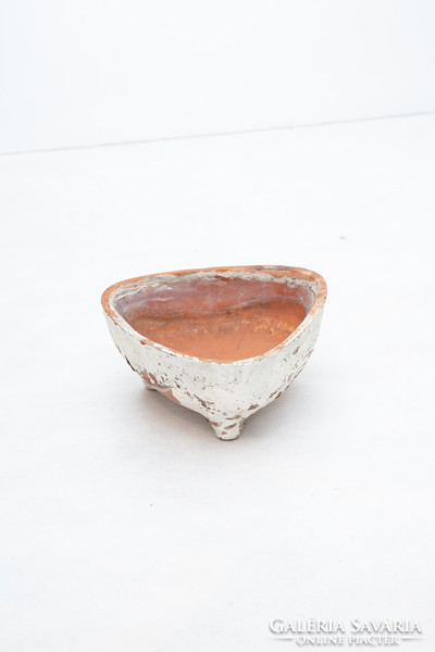 Three-legged ceramic pot
