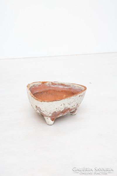 Three-legged ceramic pot