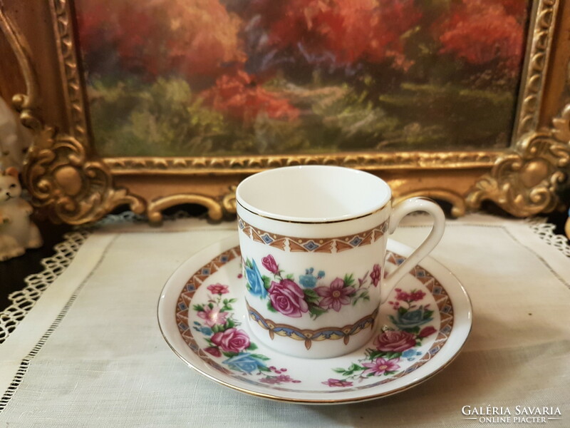 Rose-patterned coffee cup in good condition for replacement as indicated in the pictures