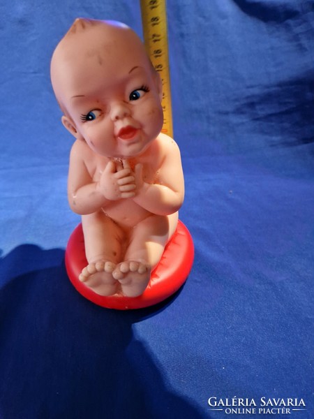 Retro toy doll laughing