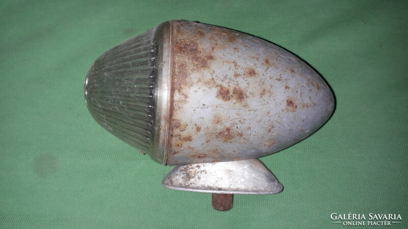 Antique very rare metal sheet bicycle lamp with intact hood as shown in the pictures