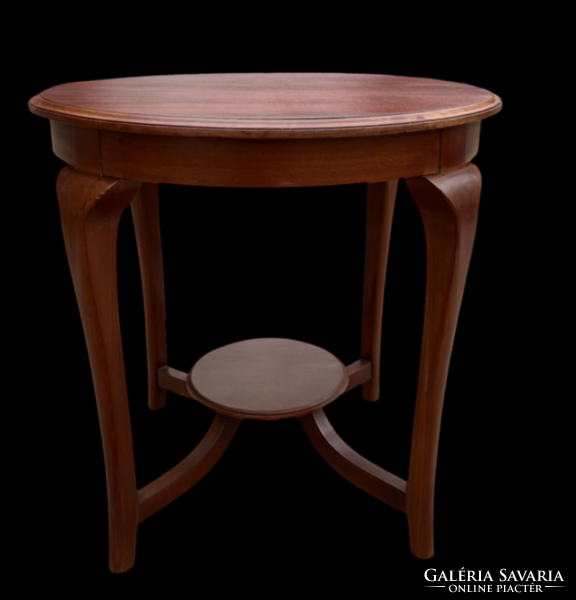 Art deco style circular mahogany coffee table