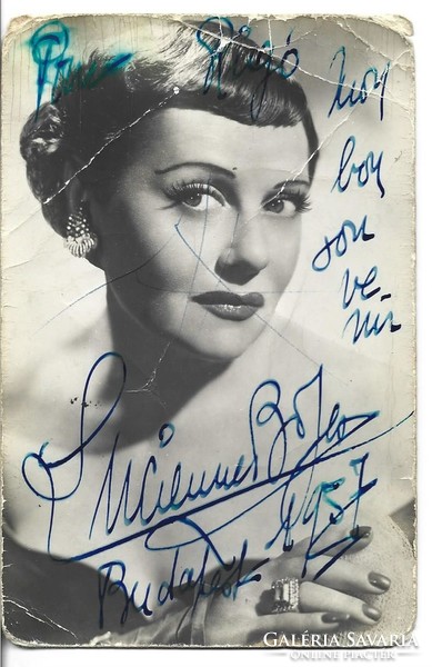 Autograph of French singer Lucienn Boyer, dedicated, handwritten signature on a photo page. In Budapest in 1957.