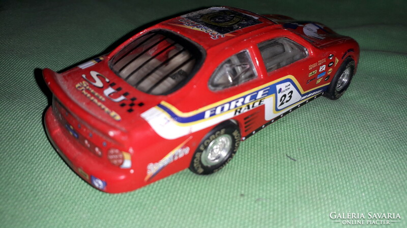 Retro 1:43 red ford thunder rally gt car with many stickers in good condition according to the pictures