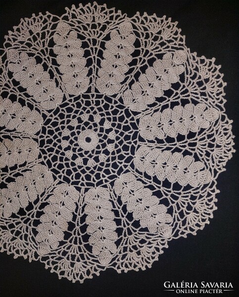 The diameter of the round crocheted tablecloth is 39 cm