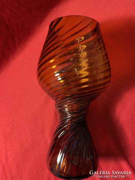 A colorful vase by an industrial artist