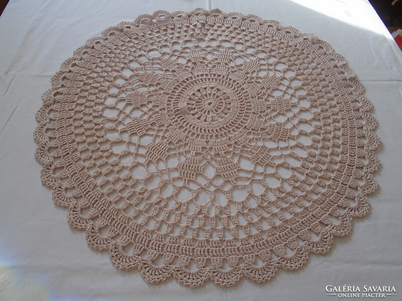 60 cm diam. Tablecloth crocheted from thick cotton thread.