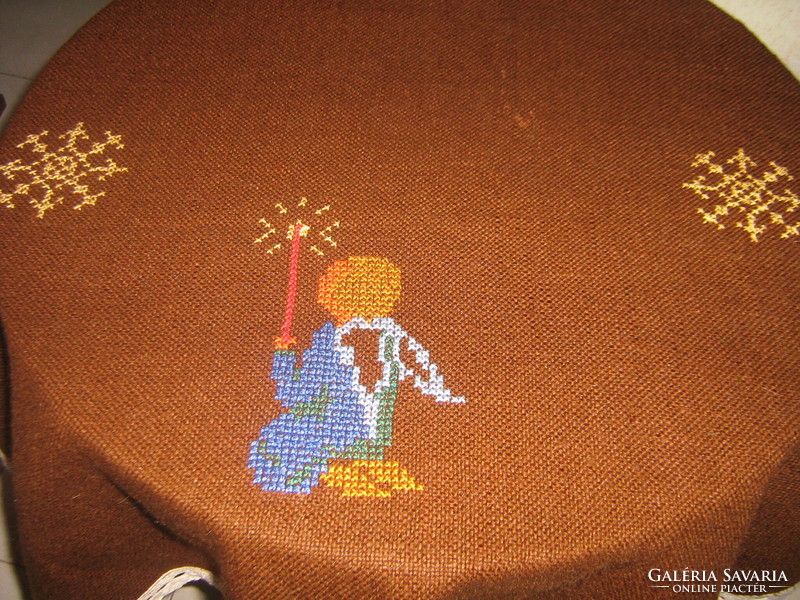 Beautiful hand-embroidered Christmas oval woven tablecloth with a lace edge