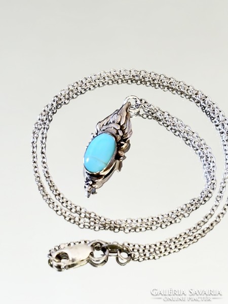 Shiny silver necklace and pendant with turquoise inlay