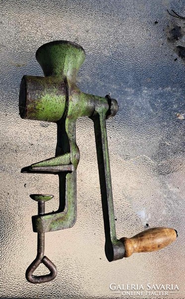 Antique green cast iron poppy grinder.