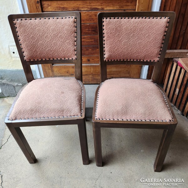 Two chairs with spring cushions