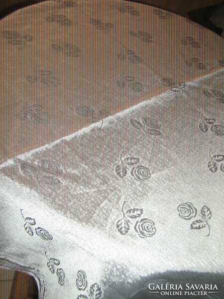 Beautiful tablecloth with a beautiful silver rose