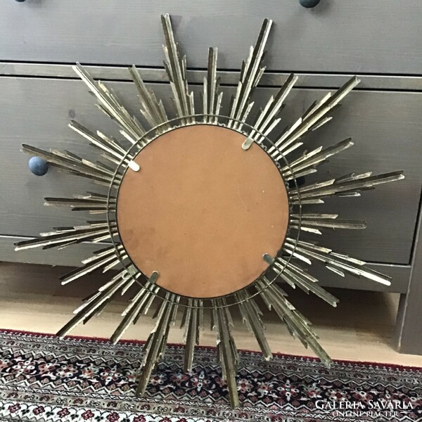 Old metal sun mirror with glass convex mirror