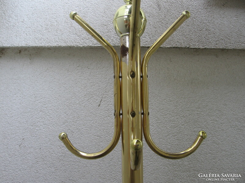 Retro gold-colored standing hanger