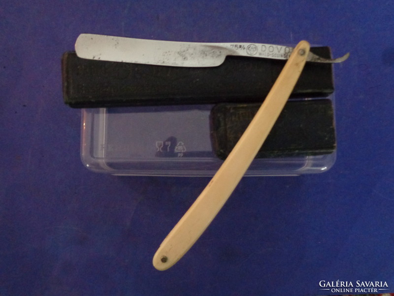 Antique soling razor in holder