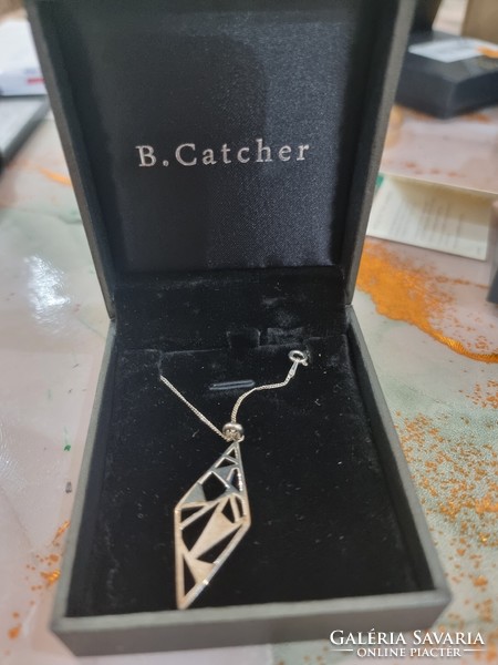 Silver necklace with pendant in box