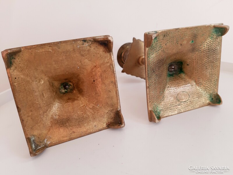 Pair of antique baroque copper candle holders