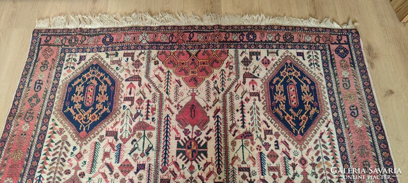 Hand-knotted nomadic Persian rug