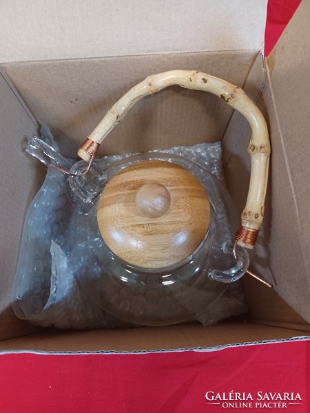 Glass teapot with bamboo lid and handle