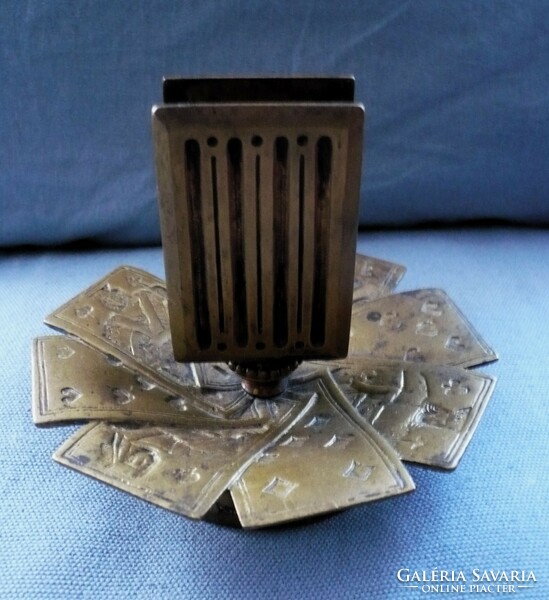 Old, heavy cast copper card casino match holder