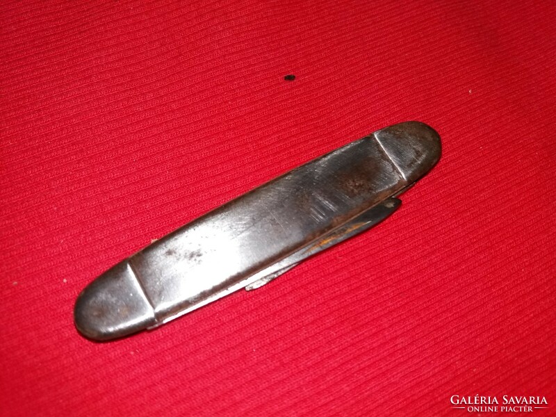Small pocket knife / scout knife with antique metal handle as shown in the pictures