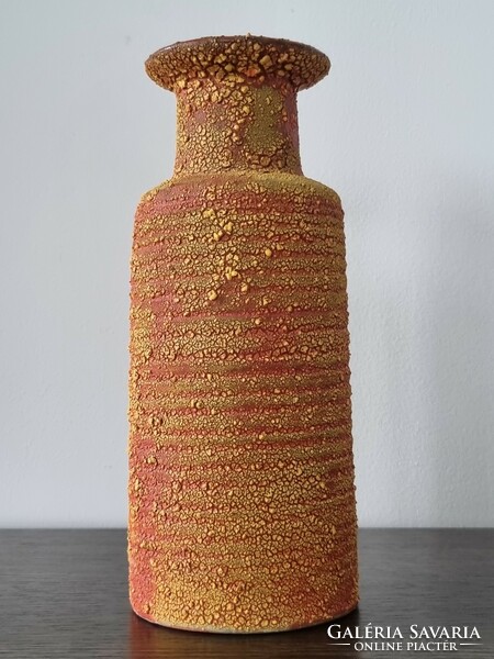 An industrial ceramic vase with an interesting surface