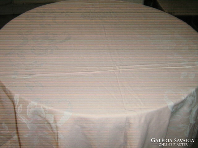 Wonderful baroque floral pattern on pink damask tablecloth