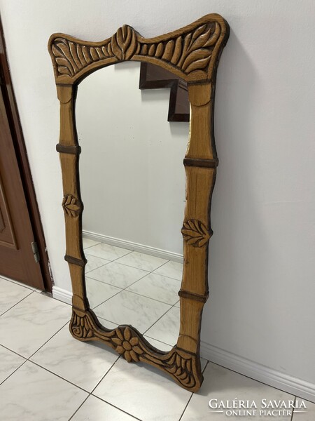 A giant carved mirror