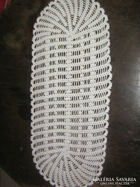 Cute hand crocheted oval white tablecloth
