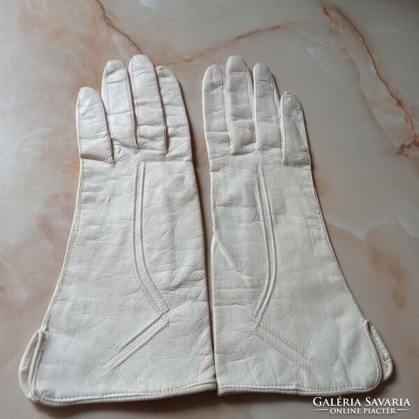 Cream-colored, thin, soft, women's leather gloves
