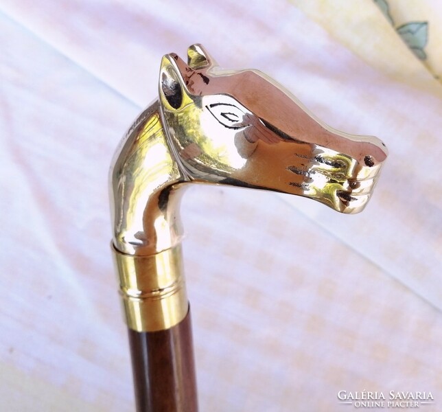Walking stick with a bronze handle, with a colt's head, with a scraper