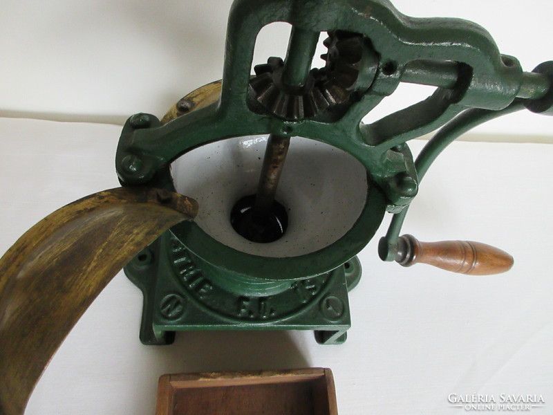 Antique, marked, large coffee grinder from a coffee shop. Negotiable!