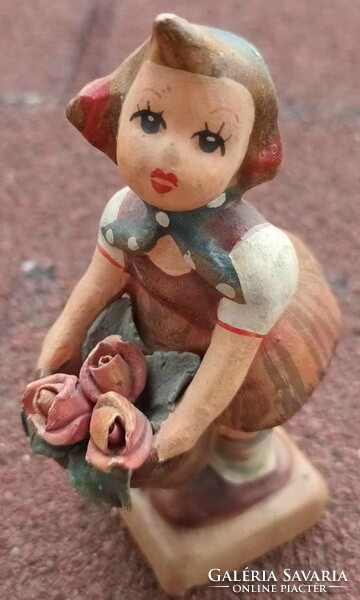 Antique ceramic little girl with flowers