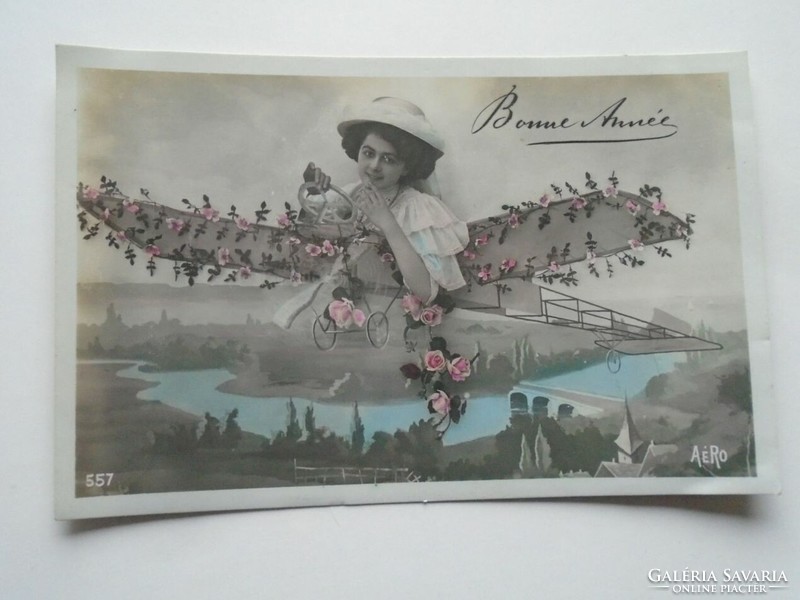 D201714 New Year's photomontage 1910 with an airplane over the city