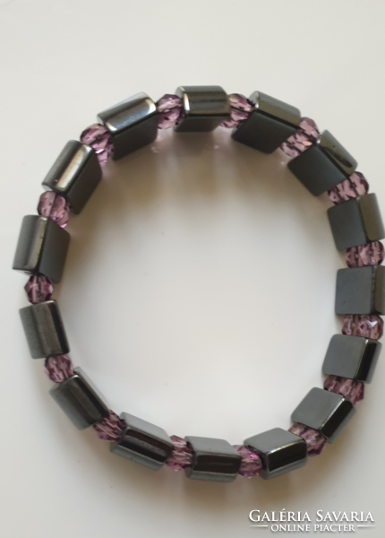 Magnetite bracelet with purple polished glass beads.