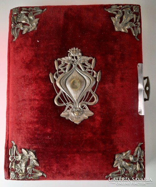 Art Nouveau photo album with velvet cover and metal decorations