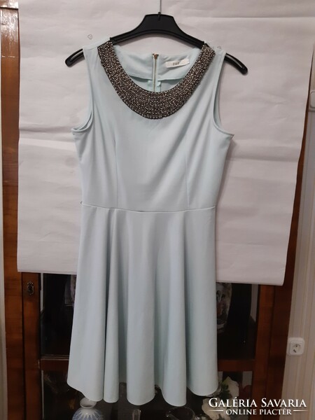 Used sea blue casual dress with silver sequin inlay. Size S.