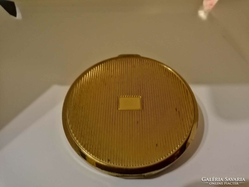 Gold-enamelled powder holder