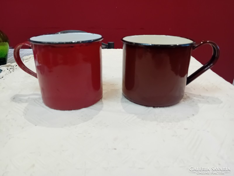 2 large enamel milk jugs