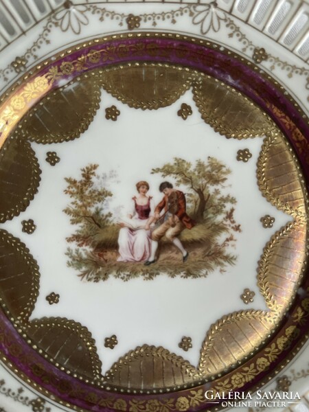 Beautiful antique scene richly gilded decorative plate with openwork edge.