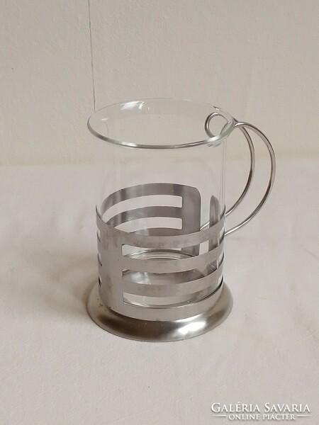 Heat-resistant glass tea coffee mulled wine glass in a stainless steel handle holder