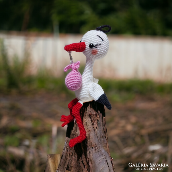 Hand-crocheted baby stork with the Amigurumi technique