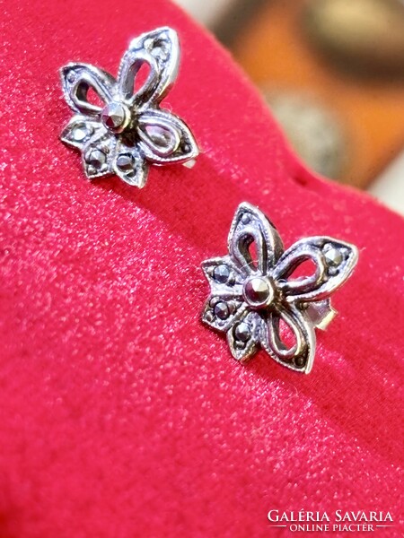 A pair of antique silver earrings with marcasite stones