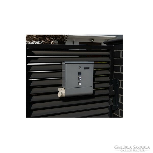 A lockable mailbox with a newspaper holder and a name plate can be mounted on a wall or fence