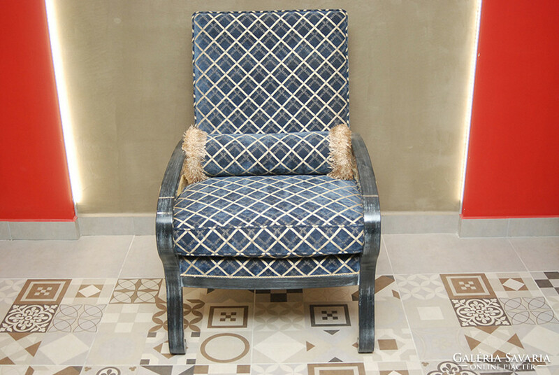 Armchair with blue upholstery