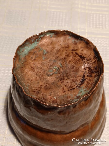 Old copper hammered caspo