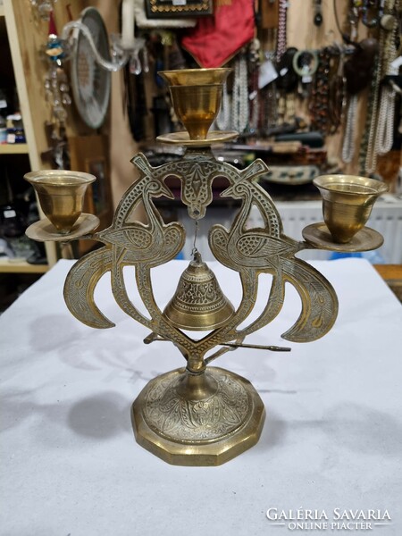 Old copper candle holder and bell