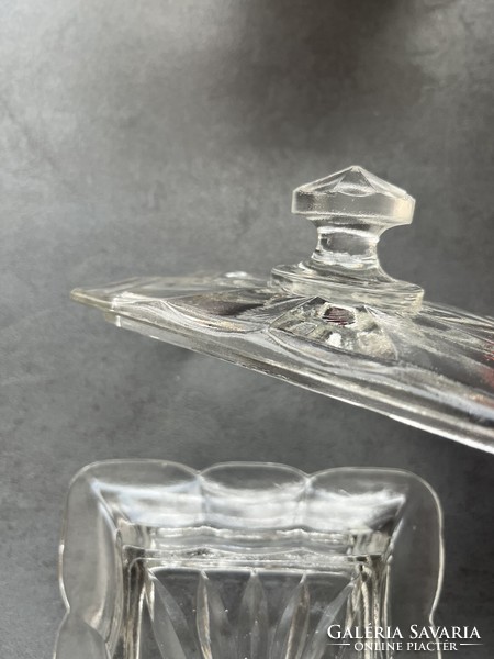 Old-fashioned molded glass butter dish