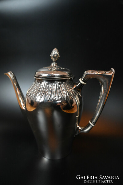 Beautiful silver jug, spout, decorated with leaves